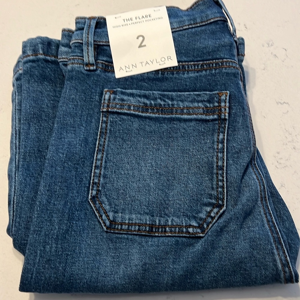 Ann Taylor medium wash jeans.